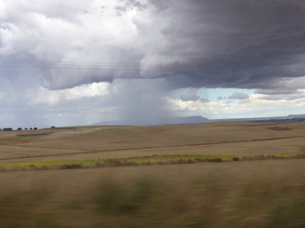 After being on the Camino for 25 days, this is the closest we got to rain!!  During the summer time, it is interesting that almost 50% of the rainfall is from thunderstorms on this prairie region. Picture taken from our cab window as we retraced our steps back to Burgos for the train  to Madrid. What had taken us 3 days to walk we made by car in less than 90 minutes. As we watched the familiar places whiz by, we realized how fortunate we were to have experienced this journey "at the speed of life".