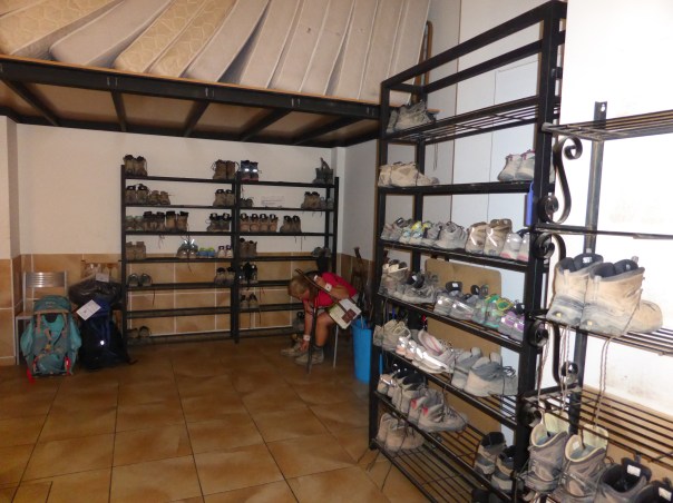 An  Auberge ( a hostel) here in Spain an Albergue - very basic communal accommodations costing from 5 to 10 Euros a night ($7 - $14) used by the majority of pilgrims. I snuck into the one here - this picture is the "boot room" 
