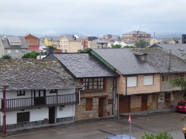 This is to try to show the different styles of slate roofing. There is an old roof on the left with two newer on the right, the newer with different shaped slate tiles.  Regarding the weather, 