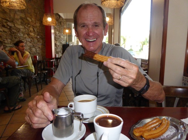 That's a churro - like a sugared stick of donut. Only here you get a CUP FULL of melted chocolate to dunk them in!! 