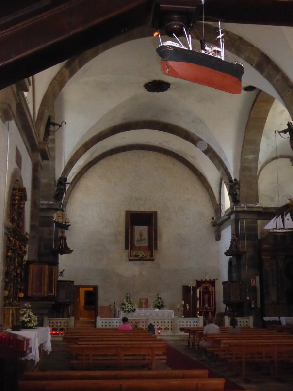 The chapel at Finisterre. Note the fishing boat suspended from the ceiling.