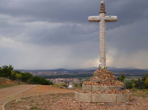 A typical Camino monument, this one just six long and wet km from our destination.  Note all the stones carefully placed at the bottom. - many picked up days before and left with the thoughts and prayers of the pilgram's.