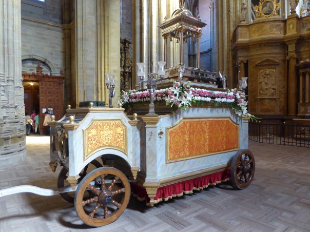 Covered in beautifully arranged fresh flowers, we caught this Corpus Christi parade entrant in the Cathedral.