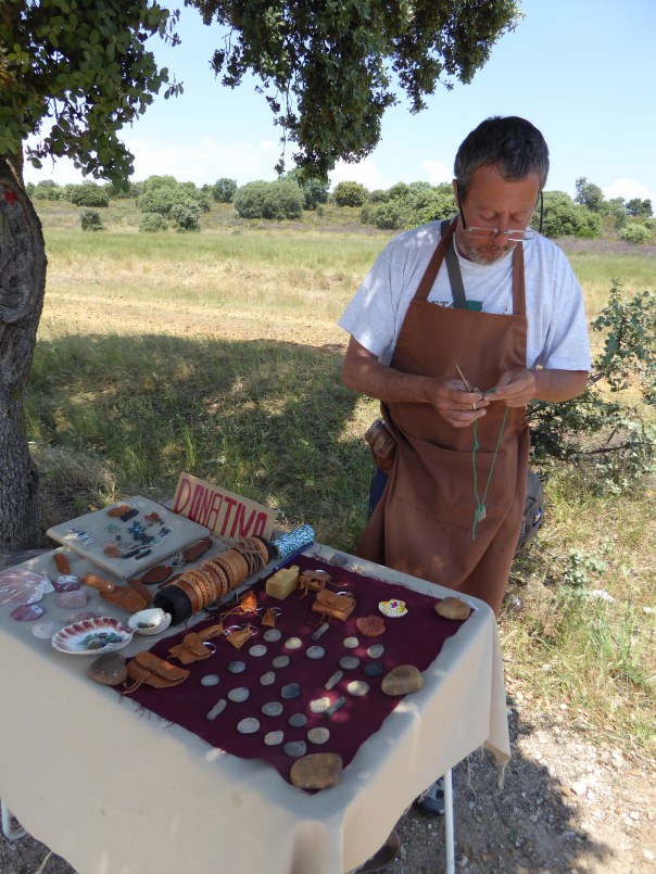 Camino capitalism at work. Here an artist has set up a table, miles from anywhere, and is selling his Camino inspired hand made items.  Others set up a snack and drink stand, again strategically placed, just where a thirsty pilgram' really needs a break. But the Camino lesson: everything we have seen being sold on the Camino, is either by donation or at prices well below the already low Spanish prices.