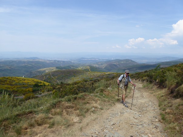 Near the top,  we will descend to the bottom of those valleys before we get to take our boots off! In fact rod made a huge mistake: travelling with three kinds of foot wear, he wore his Tevas and was not carrying any back ups in his back pack. We had not been warned of this treacherous  descent. Not the right footwear!